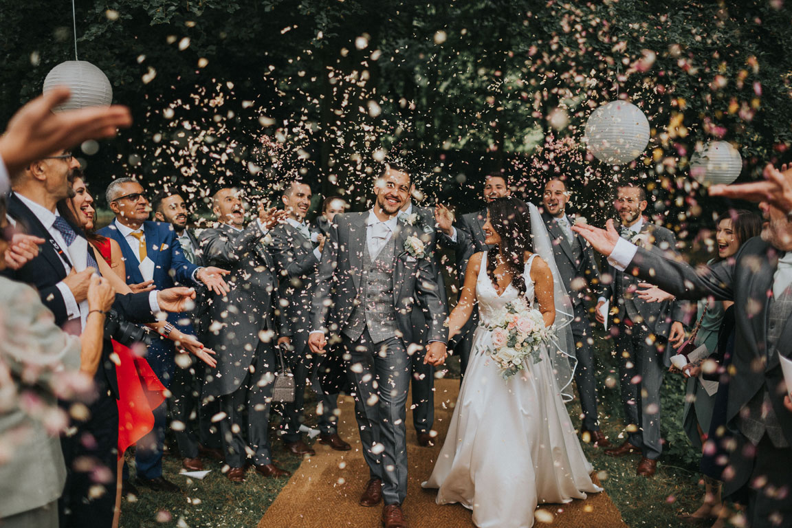 Bride and Groom with confetti